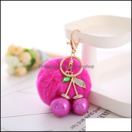 Llaveros Accesorios de moda Bola de piel real Llavero de cereza Pompom Fluffy Key Ring Titular de las mujeres Charm Bag Monedero Cadenas de automóviles Joyería Eh853 Dro