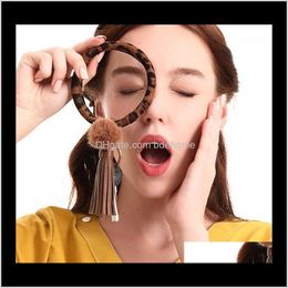 Keychains Fashion Aessories Drop levering 2021 Dierluipaard Polse Keychain -auto Key Ring Pu Tassel Hanger Hair Ball Pendant1 W21st