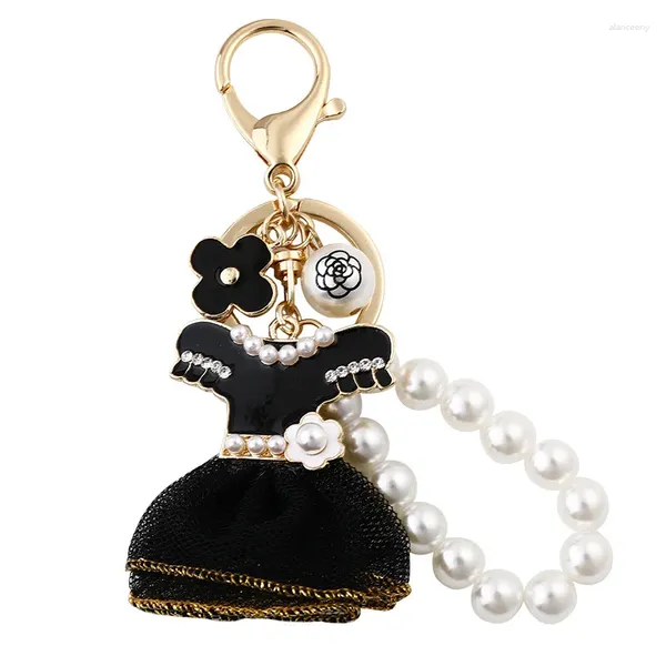 Porte-clés mode jupe noire perle porte-clés pour femmes sac charme pendentif voiture anneau créatif robe conception clés en gros