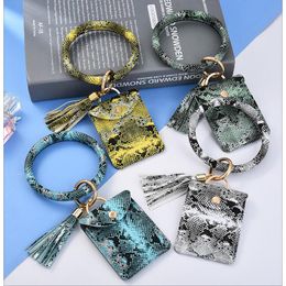 Keychains Fashion Pu Leather Case Key Chain Punk Pols Ring Serpentine Bracelet Keychain Tassel Wallet Bag Beyring Jewelry