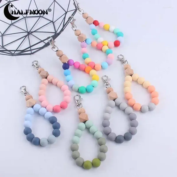 Keychins Fashion Wooden Keychain Colorido Silicona Redonda Redonda Pulsera de pulsera para mujeres Accesorio de joyería de llave de automóvil