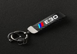 Keychains pour E30 E34 E36 E39 E46 E60 E87 E90 Car Highend Fibre en fibre de carbone Keychain à 360 degrés Rotation de clés Horseshoe Anneaux 7554801