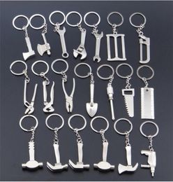 Keychains For Hommes Sac de voiture Courbeille en plein air outil de combinaison extérieure Mini Utilitaire Classe de poche Règle Hammer Cécrave Poleil 228476151
