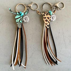 Porte-clés en cuir véritable tête de vache Totem tournesol gland porte-clés pour hommes femmes mode Boho porte-clés sac pendentif