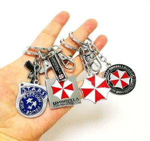 Keychains Boîte-cadeau Emballage Red Umbrella Corporation Logo Keyring Pendant Game résidents Maux Holder Key Fans Fans préférés Keyc8173626