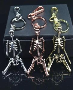 Keychains GWWFS Skeleton Pendiente Cadena de llave Hombres Mujeres de encanto Mujeres Anillo de encanto Llave Keyrings Chaveiro Gift2620603