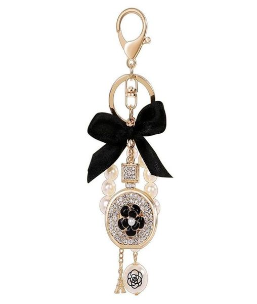 Keychains imitación de perfume de perla botella de cristal de la torre de hierro cadena de llavero llave de llave accesorios de encanto accesorios arco para mujeres keyri7885609