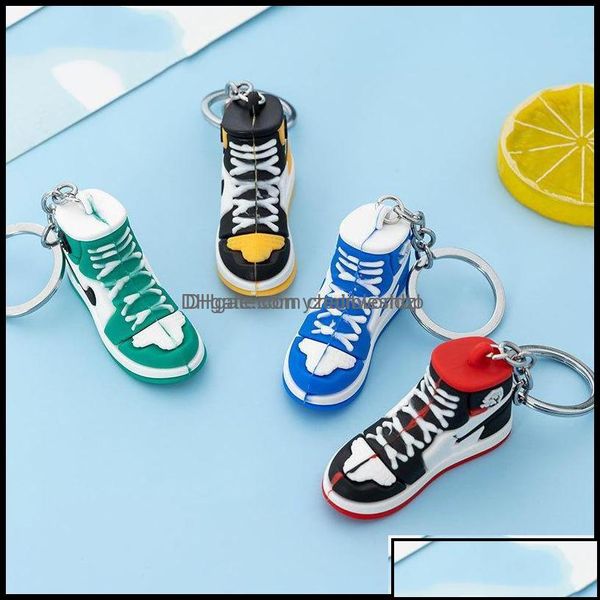 Llaveros Llaveros Accesorios de moda 2022 Venta de nuevo estilo Zapatillas de deporte estéreo Botón Colgante 3D Mini zapatos de baloncesto Modelo Soft Pla Dhqh7