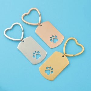 Sleutelhangers Lanyards 10 stuks groothandel roestvrij staal blanco dog tag holle poot sleutelhanger hangers voor vrouwen mannen cadeau sieraden sleutelhanger 231027