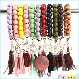 Sleutelchains lanyards 11 kleuren houten armband sleutelhanger met kwastsleutels diy houten vezel pandent boshout kraal bangle sleutel decoreren f dh7c2