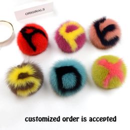 Porte-clés Longes 15CM Big Fluffy Initial Pom Handmade Real Fur Ball Porte-clés Bag Charm Monster Alphabet Letter Pompoms F73 221119