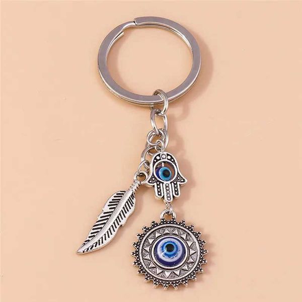 Keychains Lanyards 1pc bohemian Evil Eye Hamsa Womens Handchain Keychain Blue Sun Feather Keyring Sac Pendentif Car Keyholder Ring Wholesale Q240429