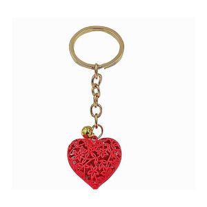 Porte-clés longes 20pcs / lot en gros coeur creux charme de la mode mignon sac à main pendentif voiture porte-clés chaîne ornements cadeau T200804 Dh1P5