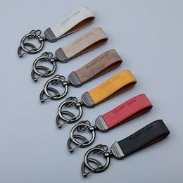 Porte-clés Longes 7 styles de porte-clés en cuir lettres en alliage sac de voiture pendentif mode couple porte-clés cadeau longue boucle accessoires fourniture
