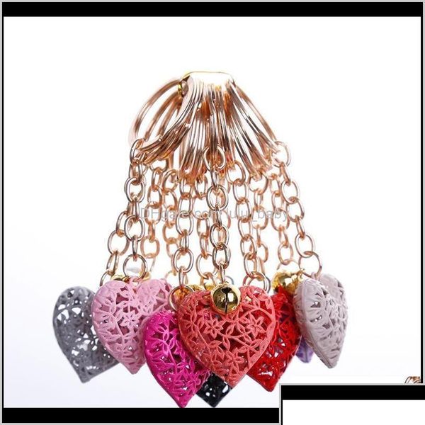 Llaves de llaves asessories20pcs/lote al por mayor de corazón hueco encanto de moda lindo bolso bolso colgante de la cadena de llaves de llaves regalo t dhlnx