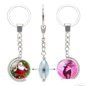 Keychains lanyards kerstglas cabochon dubbele zijden rendierboom Santa Claus Bell Snowman Hanger Rotable Key Chain Sieraden D Dh14L
