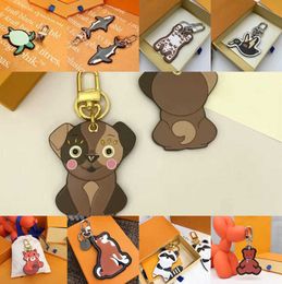 Keychains Lonyards Cartoon Classic Tiger Tiger Keychain portefeuille Course designer Animal Car Letter Fox Femmes Charme Pendre Accessoires avec boîte 28