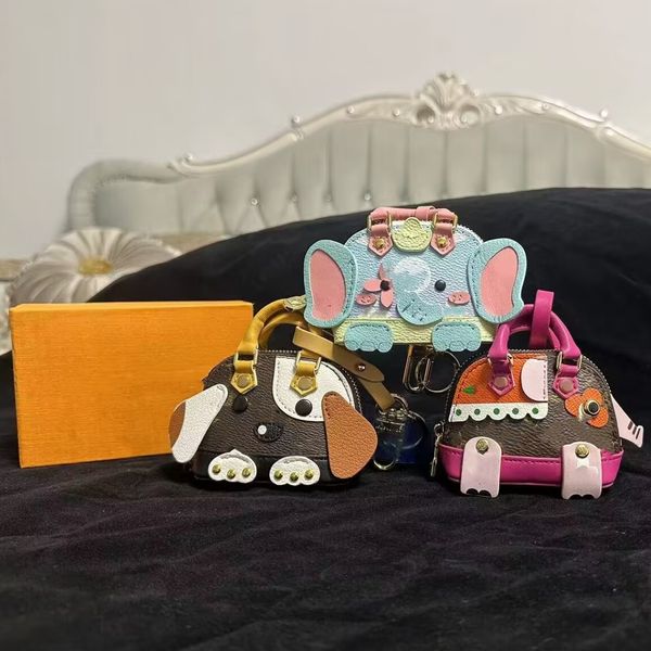 Llaveros Cordones Llavero clásico de perro con flor antigua Mini bolsa de maquillaje Elefante Shell Zero Monedero Llaveros Llavero de diseñador Llavero de cuero Regalos navideños