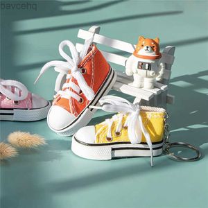 Keychains Lonyards coloré en toile 3D Sneaker Keychain Coupte mini-chaussures avec anneau clé Filles Sac Pendante Décoration Funny Party Cadeaux pour les enfants D240417