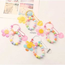 Keychains Lonyards Creative Candy Color Cavyring Souriant Face Sun Flower AirPods Keyfob Pendant Femmes Mobile Phone Shell Perles Pendre Pendre