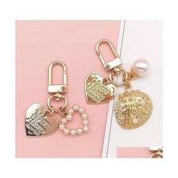 Keychains Lanyards Leuke Pearl Shell Keychain Ins Metal Jewelry Sleveren accessoires Creative Small CadeaL Bag Pendant Drop Delivery Fa Dh7wa