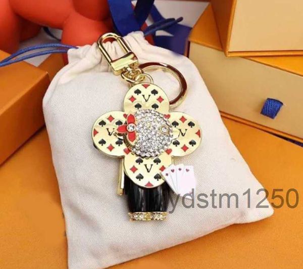 Porte-clés Longes Design Sac Charms Designer de luxe Couples Porte-clés Nouveau Tournesol Anneau Pendentif Mignon Panda Titulaire Accessoires De Mode Pour Femmes Hommes04 2XO6