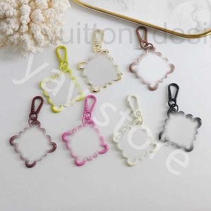 Porte-clés Longes Designer Marque Géométrique Graphique Porte-clés Femelle Exquis Luo Creux Goutte Glaze Multicolore Sac Boucle Multi Usage Pendentif Ornement DPYR