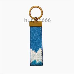 Keychains Lonyards Designer Lettre de fleur Sac de voiture en cuir clé Lonyard Classic Kechechains Fashion Men Femmes Charme Pendent