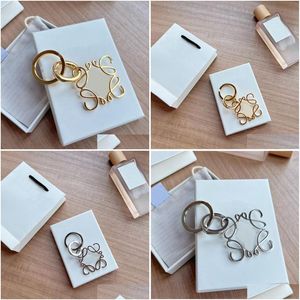 Keychains Lanyards Designers Chain Chain Portachivivi Gold Fashion Keyring Glaze Dreigner Keychain Luxury Bag Pants Pantalon pour Dhaxk