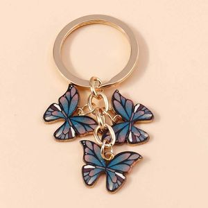 Keychains Lonyards exquis émail papillon porte-clés charmant animaux et hommes sac à main