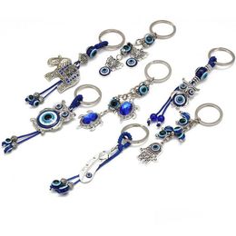 Llaveros Cordones Moda Animal Mariposa Tortuga Elefante Ojos malvados Llavero Llavero de cristal Ojo azul Colgante Ornamento Gota Delive Dhojk