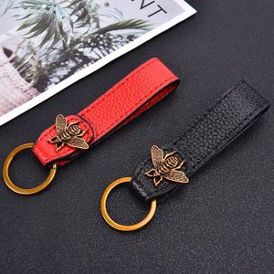 Porte-clés longes marque de mode Design de luxe porte-clés haut de gamme en cuir d'abeille dorée porte-clés de voiture d'affaires pour hommes anti-perte bracelet porte-clés 231006