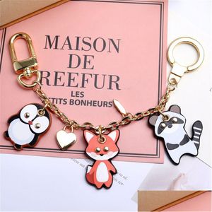 Keychains Lanyards Cartoon Couchette Key Chain Sac Car Pendentif Métal Hook avec boîte cadeau adaptée aux hommes Médies Enfants Designer Key Dhgwj