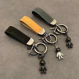 Porte-clés longes porte-clés astronaute pendentif en cuir porte-clés anneau ornements cadeaux pour hommes et femmes accessoires de voiture 230710