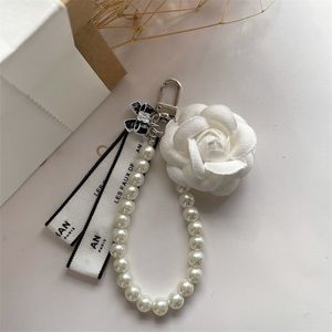 Llaveros Cordones Llavero Diseñador Llavero Llavero Bolsa de lujo Encanto Moda Tendencia Coche Llavero Flor Perla Llavero Alta calidad Regalo Regalo Niza 2024 Nuevo