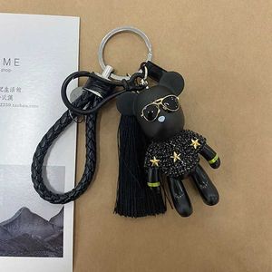 Keychains Lonyards Corde tissée en cuir Bomgom Popobe Keychain Glossy Tassel Coursier Coursier Sac de support Black Pendentif Black Penserie Eyeglass Bear Q240429