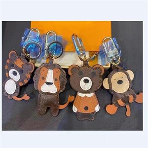 Llaveros Lanyards Lion Tiger Monkey Bear Diseñador de lujo Llavero de cuero Láser en relieve Bolsa Colgantes con caja 1853231E Drop Del267Y