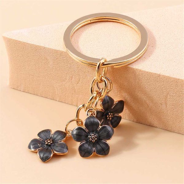 Keychains Lonyards Mini fleur séchée clés de fleurs immortelles Plantes florales clés pour femmes Chaînes de bouteille de bouteille clés de la voiture