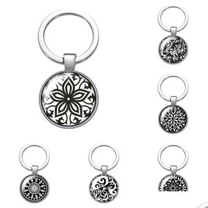 Porte-clés Longes Nouveaux Motifs Noirs Fleurs Cabochon En Verre Porte-clés Sac De Voiture Porte-clés Anneau Titulaire Charmes Sier Couleur Pour Les Femmes Cadeau Dh9Rl