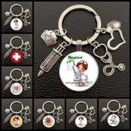 Keychains Lanyards Nieuwe/hoogwaardige verpleegkundige medische spuitstethoscoop Stethoscoop Afbeelding Keychain Glass Cabochon en Dome Key Ring Pendant Gift. CH SMTH4