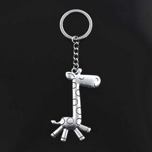 Keychains Lanyards Nouveau porte-clés 66x36 mm Running Girafe Bronze Silver Pendant Diy Mens Car Bracelet Jewelry Gift Q240403