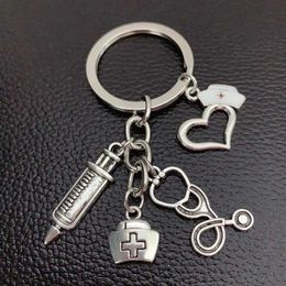 Keychains Lanyards New Nurse Medical Box Medical Key Key Chain à aiguille Stéthoscope Keychain Jewelry Medicine Graduate Gift Y240510
