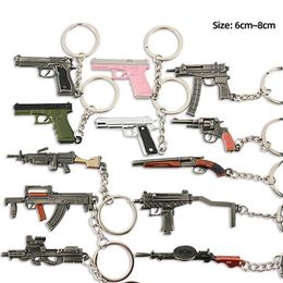 Keychains Lanyards jeu populaire Keychain Jewelry Arme Mini Gun Model Metal Pendent Keychain Fashion Championo Sac Car Keyholder Childrens Gift Q240521