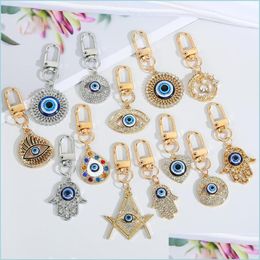 Keychains lanyards regenbooghand sleutelhanger sleutelring voor vriendenliefhebbers bling hart blauwe oogtas autobox accessoires drop levering 202 dh8v7