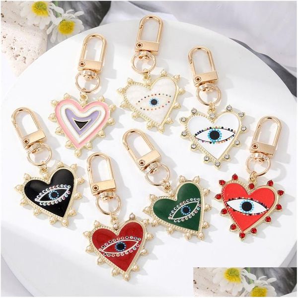 Llaveros Lanyards Rhinestones Pearl Evil Eyes Aleación Hombres Mujeres Melocotón Amor Corazón Devils Bolsa Coche Llavero Colgante En BK Drop Entregar DH2YE