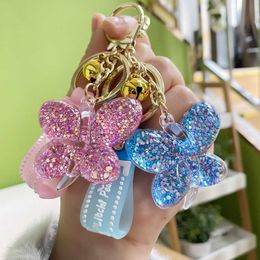 Llaveros Nuevo llavero de lentejuelas acrílicas bolsa personalizada cordón lindo mariposa niña teléfono móvil cadena accesorios G230525