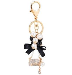 Keychains Pearl Alloy Metal Handtas Key Chain Fashion Ring POM Geschenken voor vrouwen Girls Bag Charm Keychain Hanging Hanger Sieraden6276995