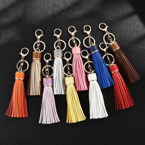 Porte-clés en cuir PU avec pompon, élégant, tendance, anneau en or, pour femmes, sac, breloques de voiture, accessoires 291c