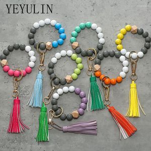 Porte-clés en cuir PU avec pompon pour femmes, perles en bois, bracelet, multicolore, bijoux à la mode, vente en gros, Miri22