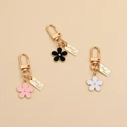 Keychains kleine daisy bloemensleutelhanger voor dames tas charme sleutelhanger auto ring hanger accessoires